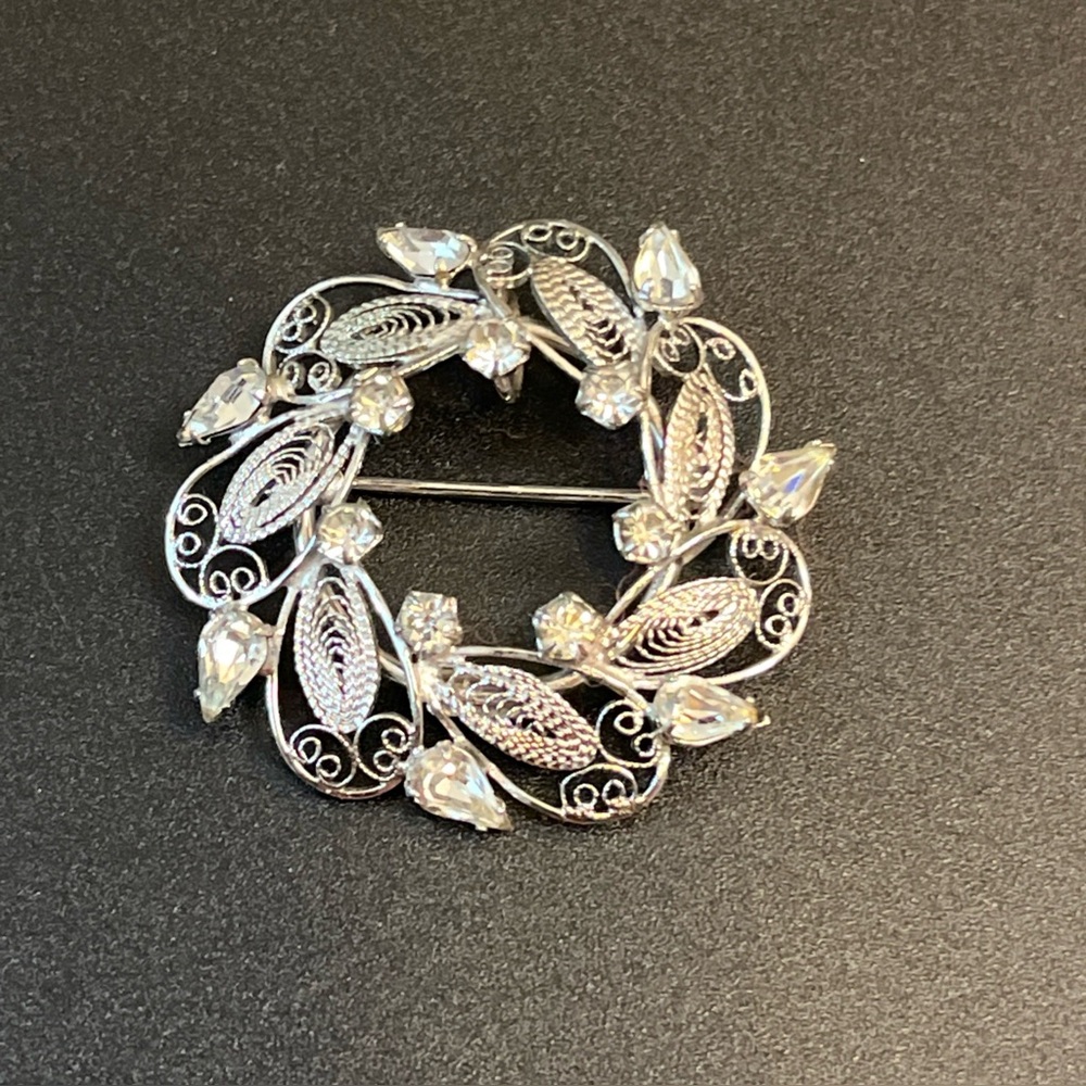 Elegant Silver Brooch with Crystal Accents